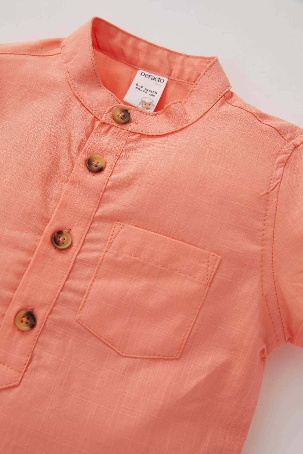 پیراهن نوزاد پسر نگیندار مارک دفاکتو رنگ نارنجی کد ty106219654