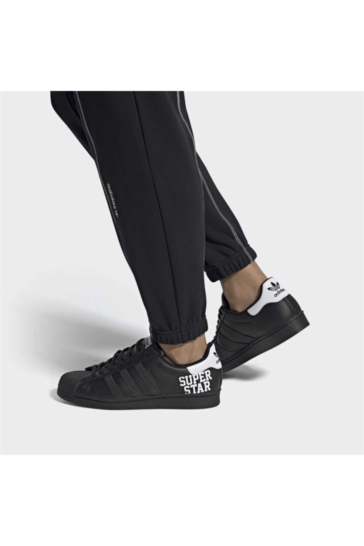 کفش مخصوص پیاده روی مردانه اینترنتی برند adidas رنگ مشکی کد ty46405556